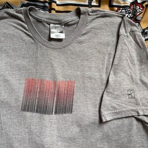 Vintage 90s Nike tennis t-shirt Large made in USA gray repeating spell out